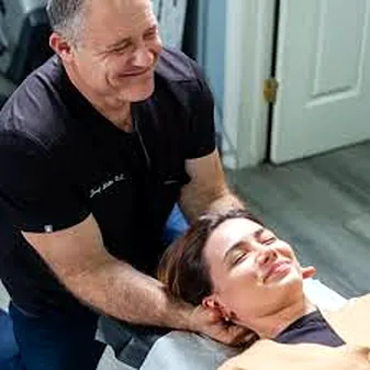 Dr. Josef Malkis treating a patient